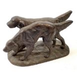 A heavy bronze finish group of two retrievers, 26cm long