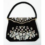 A vintage floral beadwork handbag