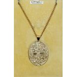 A 9 carat gold large oval locket and chain in fitted case, 28.5g