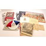 A box of coronation memorabilia including jigsaw puzzle, first day cover, hat, heraldic shields,