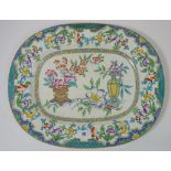 A Mintons floral meat platter, 42cm long