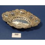 A silver embossed and pierced oval dish, Birmingham 1903, Haseler Brothers, 60g