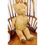 A large Edwardian gold mohair straw filled teddy bear, 74cm