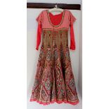 An Indian jewelled and beaded wedding dress, size 14 approx