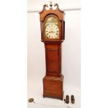 An oak long case clock with swan neck pediment over painted arch top dial with seconds hand and date