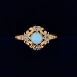 A Victorian gold ring set turquoise and chip diamonds, 1.4g, size K to L, unmarked but tested as