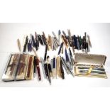 A large box of ball point pens, fountain pens, pencils etc.