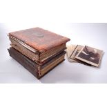 Two Victorian photograph albums containing over seventy photograph cards