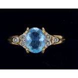 A 9 carat gold dress ring set blue zircon, size V