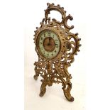 A 19th century French brass scrollwork easel mantel clock, 27cm tall