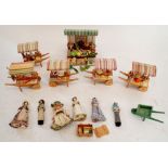 A vintage model of a market with barrows and figures