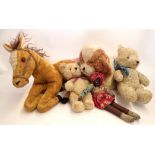 A group of vintage teddies and toys