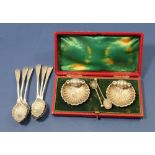 A set of six silver coffee spoons embossed flowers, Sheffield 1897 and a pair of silver shell