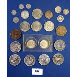 A quantity of USA coinage and medallions including: dimes, cents, quarter, half, dollars, 20th