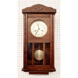 An oak glazed wall clock, 58cm tall
