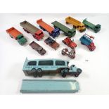 A collection of Dinky trucks including Foden, Guy, Dodge, Leyland Cornel etc. and a transporter