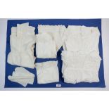 Four cotton christening gowns, a silk one, a Victorian baby's dress, large shift nightdress etc.