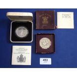 Two cased coins including: Royal Mint issue: silver proof commemorative crown, 80th birthday Queen