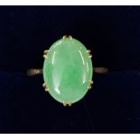 An 18 carat gold ring set jade, total weight 3.2g - jade 1.5cm long
