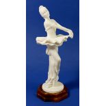 An Italian composite figure of a ballet dancer on 'marble' base, 27cm tall