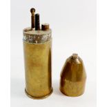 A large trench art table lighter made from a brass shell casing, 23cm