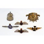 Four various RAF badges, an ARP badge and Australian Commonwealth cap badge