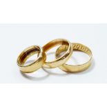 Three 9 carat gold wedding rings, 12g