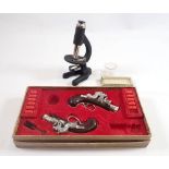 A pair of The Pirate toy pistol pellet guns boxed and a child's microscope