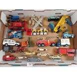 A collection of mainly Dinky die cast assorted vehicles including tractors, lunar roving vehicle and