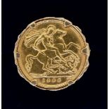 A gold half sovereign ring mounted on 9 carat gold, Edward VII, 1906, size V, total weight 10.5g