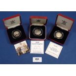 Three Royal Mint 50 pence silver proof commemorative issue in presentation cases and certificates