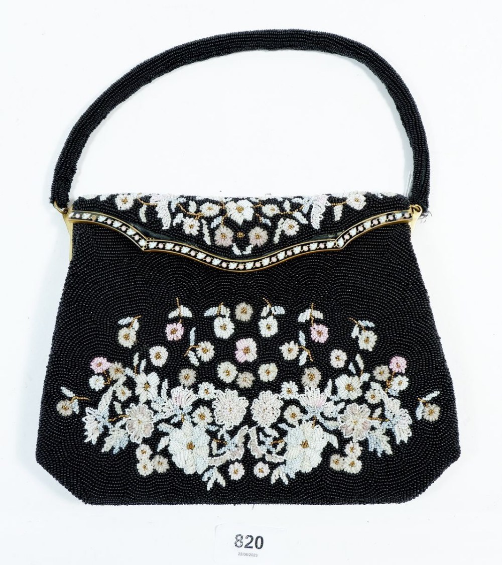 A vintage floral beadwork handbag