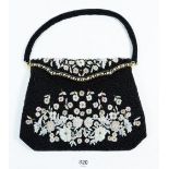 A vintage floral beadwork handbag
