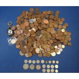 A quantity of coinage including: British pre-decimal and decimal, halfpennies, pennies etc. some