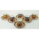 Six matched early 20th century Imari pattern Royal Crown Derby coffee cups and saucers