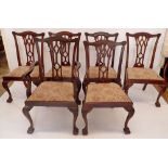 A set of six early 20th century Chippendale style mahogany dining chairs with interlaced backs, drop