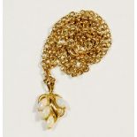 A 9 carat gold opal set leaf form pendant on 9 carat gold chain, 7.2g, chain 50cm