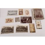 Twenty postcards and photographs including social scenes, studio cards, two Bonfire at Chiselhurst