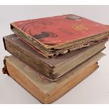 Three postcard albums including two mainly topographical and one of theatrical actors and actresses
