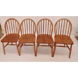 A set of four Ercol Windsor chairs with CC41 290 stamp to reverse