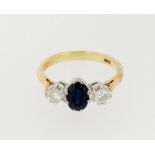 An 18 carat gold sapphire and diamond ring, size O, 4.1g