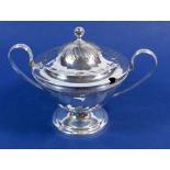 A silver two handled sauce tureen, London 1800 by Thomas Holland, 385g, 14.5cm tall