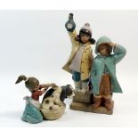 A Lladro group of boy and girl with lantern plus girl washing dog - good conditon