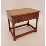 A vintage oak low work table with carved frieze, 52 x 35 x 25cm