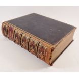 A Victorian illustrated family bible with over 900 engravings, leather bound