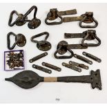 A collection of cast metal garden gate handles and latches with fixings together with a pair of cast