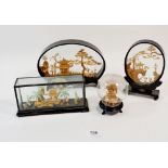 Four various Chinese carved cork landscapes, glazed