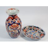 A Japanese Imari vase, 21cm tall and a small oval dish