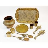 A collection of various Eastern and Indian brass, copper and metal items including a tray embossed