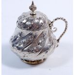 A silver mustard pot with spiral embossed harebell decoration, London 1857 by George Angell, 142g,